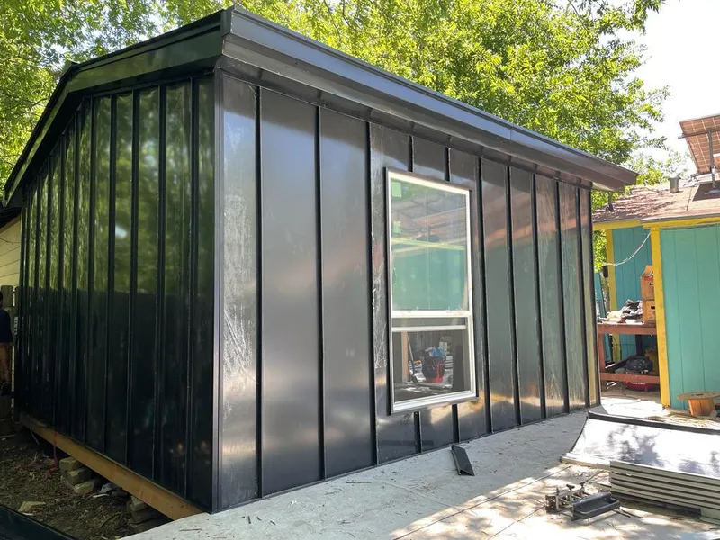 Black standing seam metal wall panels for Metal Roof Installation in Jennings