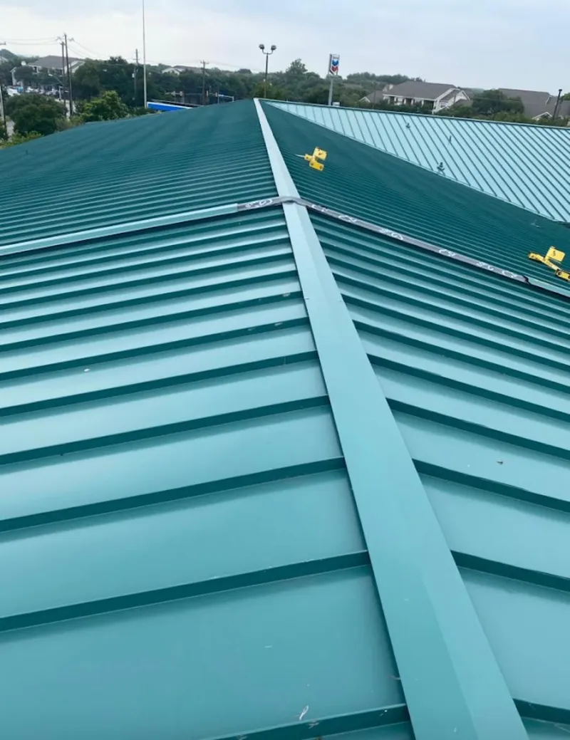 Green commercial metal roof ridge and valley for Metal Roof Repair in Jennings